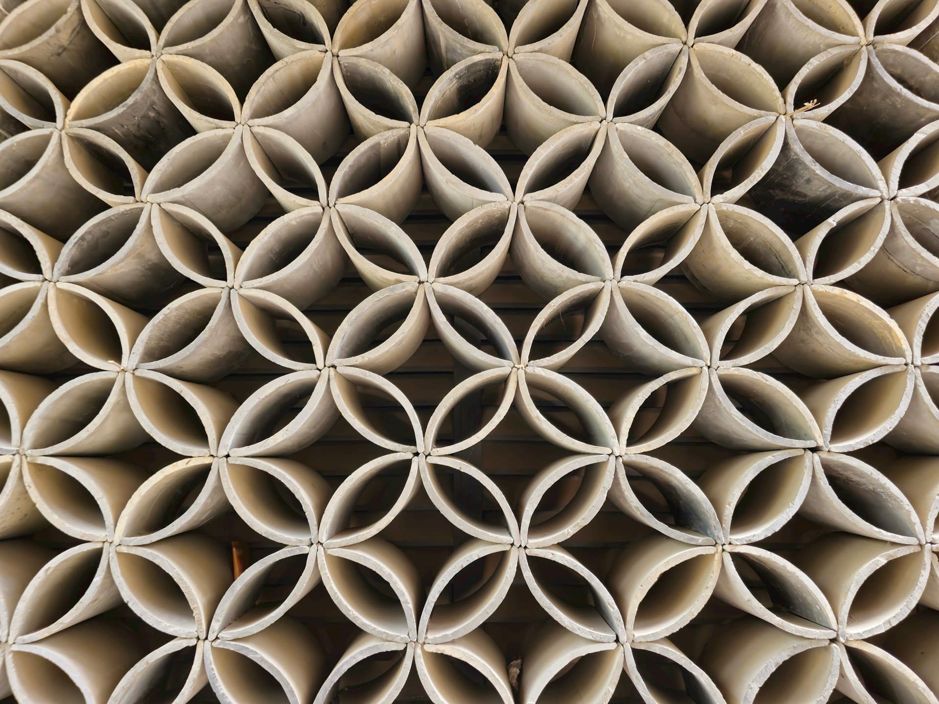End view of stacked ceramic tubes resembling a multi-channel ceramic membrane monolith