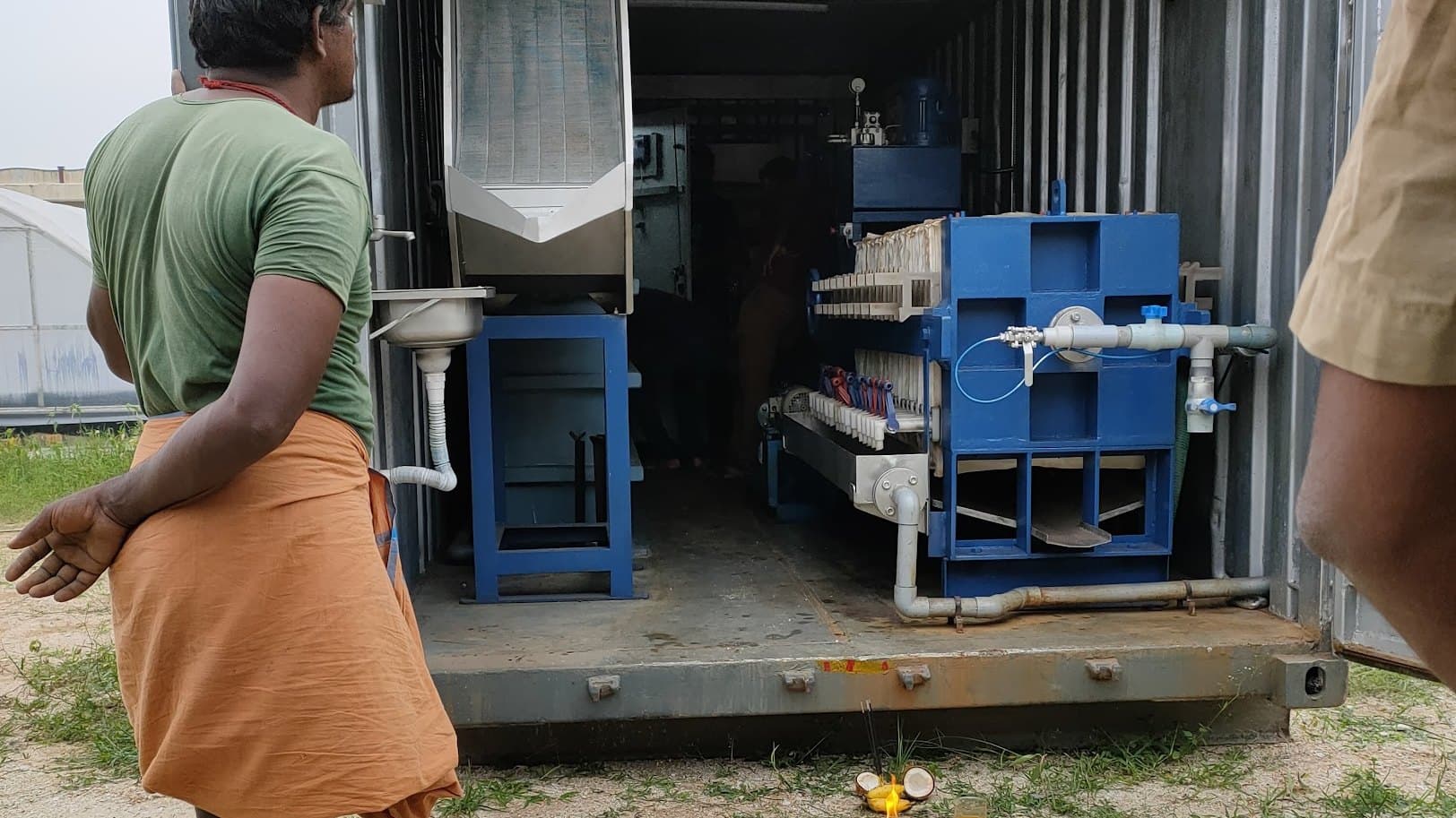 Containerised water treatment unit installed in a shipping container at a remote site — treatment capacity delivered where the demand is