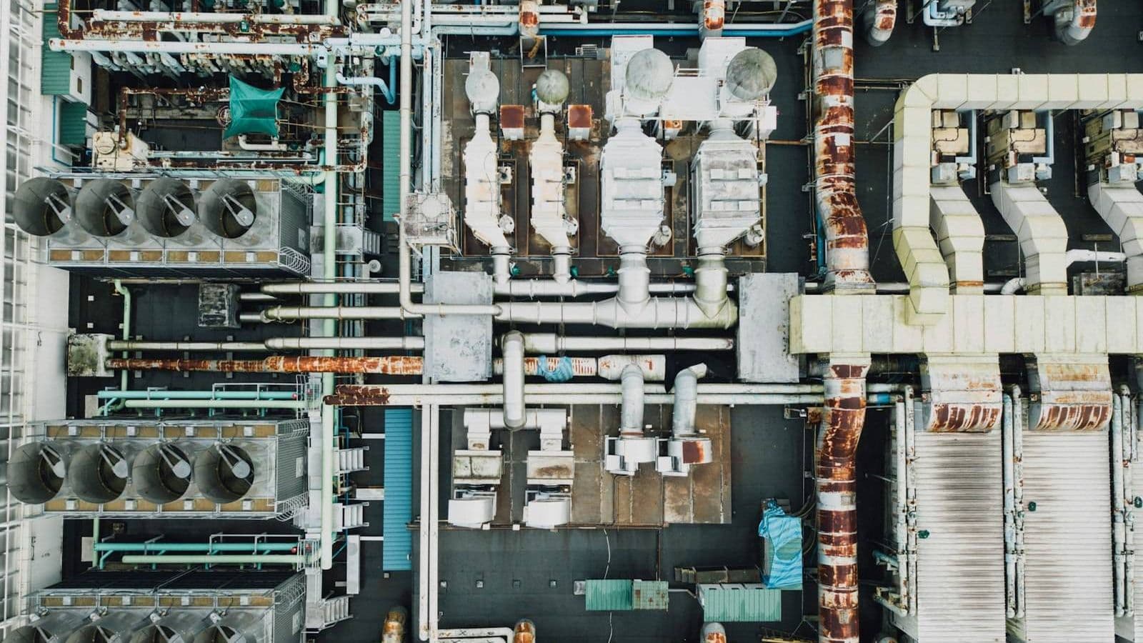 Aerial view of an industrial factory complex showing the scale of process plant infrastructure typical of industrial wastewater treatment facilities