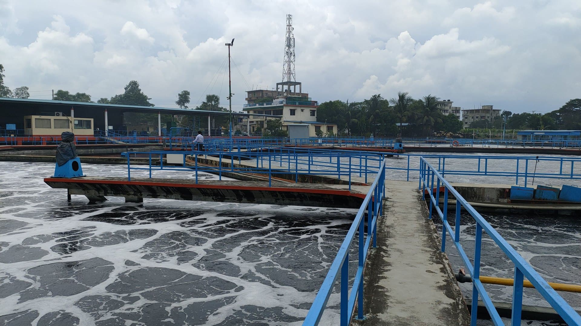 Conventional activated sludge aeration tanks at an industrial wastewater plant, the biological baseline against which MBR is compared