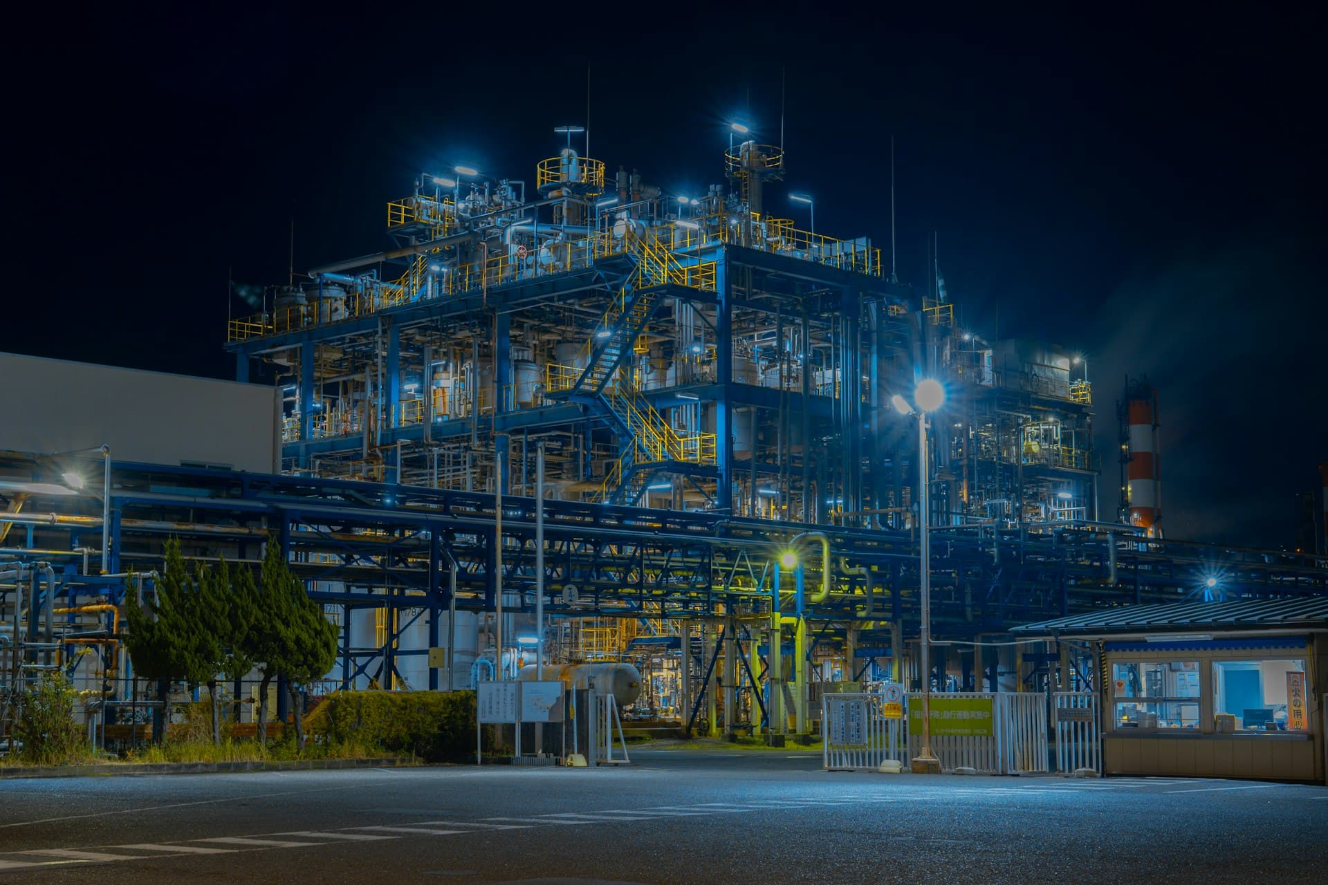 Industrial evaporation and crystallisation plant lit up at night — the hardware behind zero liquid discharge